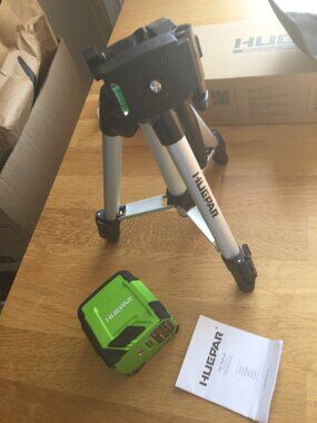 NWT Huepar laser level with tripod tripod measures 27" tall when extended